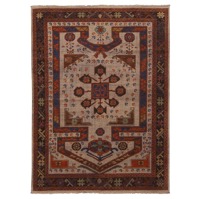 An 8x9 hand-knotted wool rug from the custom-classics Burano Collection by Rug & Kilim. Enjoying rich red and blue hues...