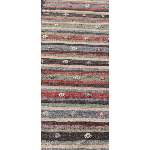 Turkish Vintage Kilim Striped Runner With Tribal Motifs in Copper and Greens For Sale - Image 9 of 11