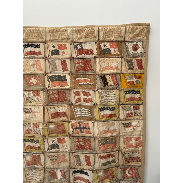 Incredible folk art tapestry made from cigar felts from various countries quilted together. Circa 1900-1915. Quilt is...