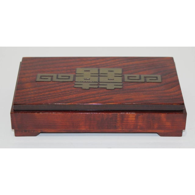 Art Deco 1950s Wood Box With Asian Symbols brass inset from a Palm Beach estate