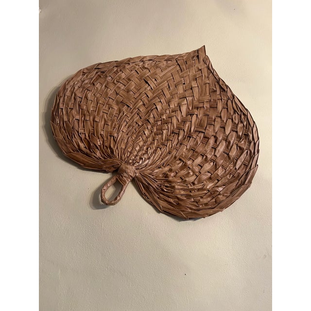 Very large Very rare Rattan Boho Chic Wall fan in excelente condition. Approximately 36” at the widest point.