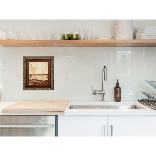 Add rustic charm and timeless elegance to your space with this stunning abstract piece. Set in a masculine wood and gold...