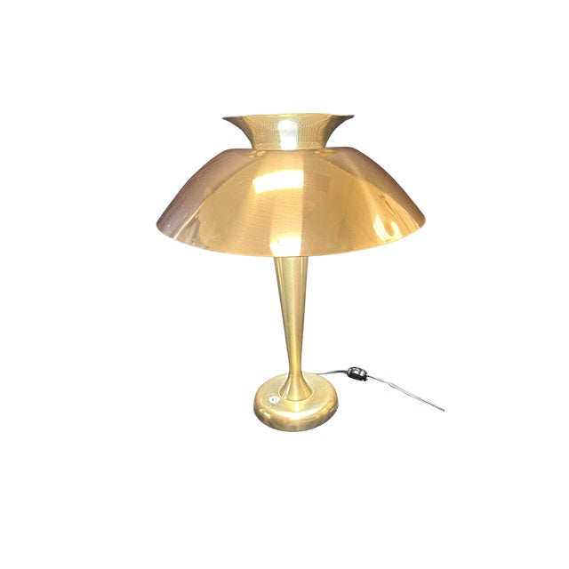 Poul Henningson Mid Century Style Reflector Table Lamp- Aluminum in a brass finish. Standing at 19.5" tall by 15.5" wide,...