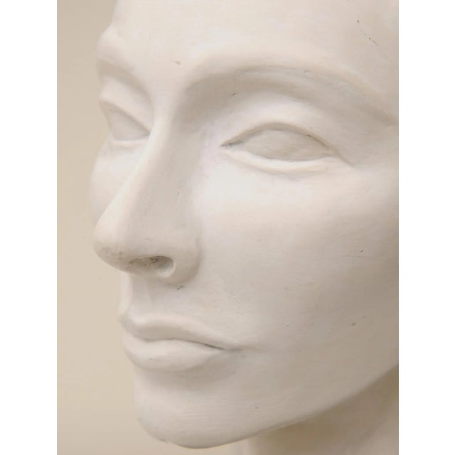 This vintage stunning plaster of paris Italian 1960's bust of a elegant head of a woman has fine features and a beautiful...