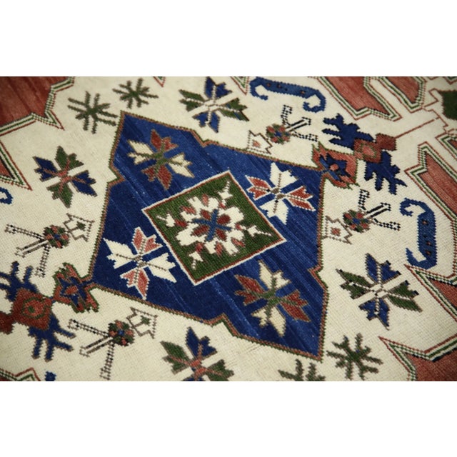 Introducing a one-of-a-kind vintage Turkish hand-knotted wool rug, carefully crafted by skilled artisans using traditional...