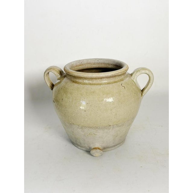 Glazed terracotta pot, France, 1960s, with rustic and authentic charm. This piece has a well-balanced, rounded shape,...