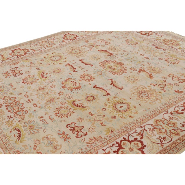 Hand-knotted in wool, this 8x10 modern rug originating from China and featuring floral patterns in the all over style, is...