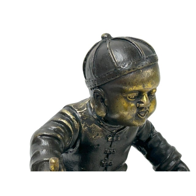 Vintage Bronze Color Metal Old Style Dressing Kid Grinding Pose Statue For Sale - Image 11 of 13