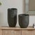 This Set Of Two Earthenware Vases Features A Striking Matte Black Finish With A Rich, Rustic Texture. Their Unique,...