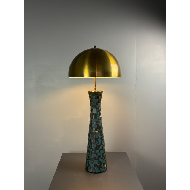 Rare mosaic and brass inlaid double light fixture which can be used a as large table lamp or low floor lamp. The lamp has...