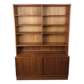 Danish Modern Two Piece Shelving Unit With Adjustable Shelves and Sliding Door Cabinets For Sale