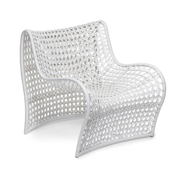 An open weave of leather covers a sensual shape, making the Lola chair a perfect design for style and comfort.