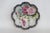 This gorgeous Scalloped Painted Dish is made of porcelain. This stunning piece features a hand painted bouquet motif of...