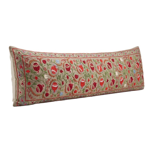 This beautiful 18'' x 74'' hand-embroidered Suzani pillow cover was made from authentic Uzbek cotton fabric. The intricate...