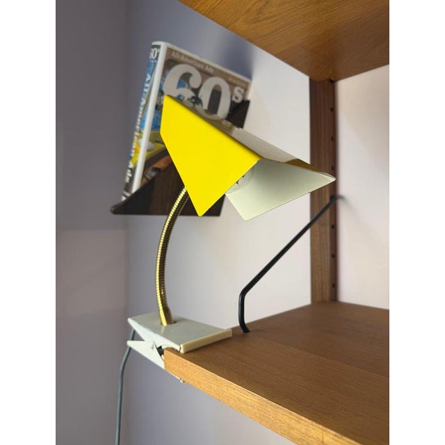 A charming piece of 1950s german design history: this yellow clamp lamp by hoso (hoffmeister & sohn) perfectly embodies...
