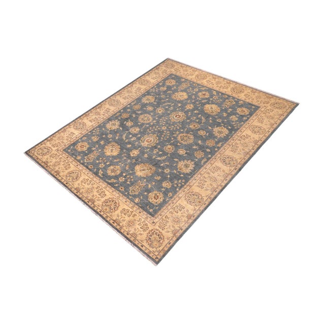 "Enhance the ambiance of your home with this magnificent Persian-influenced Turkish hand-knotted rug made by skilled...