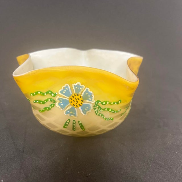 Offered is a beautiful antique Victorian satin art glass ruffled bowl bearing the WEBB mark on the base. This elegant...