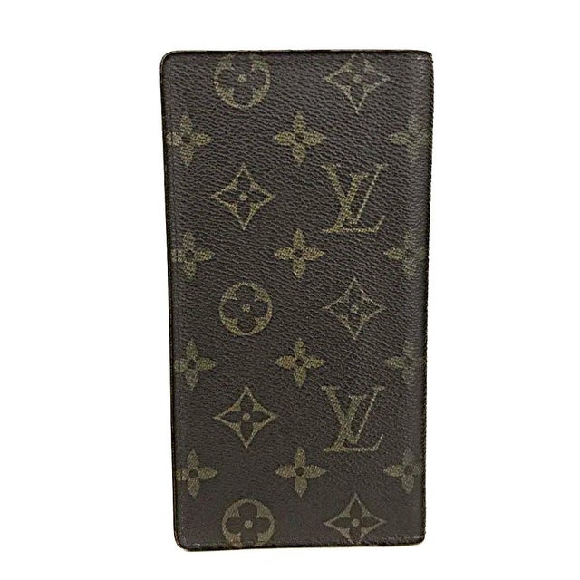 Authentic Louis Vuitton Porte Cartes Crédit Yen Monogram Long Wallet (3.75x7). Good to Very Good (B/B+) vintage condition....