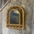 Vintage Arched mirror with detailing in the frame 56cm height 44cm width