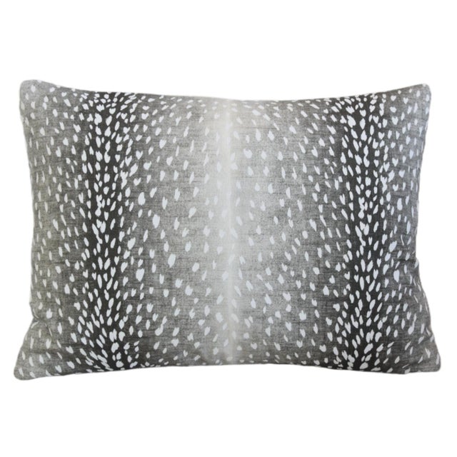 Custom-tailored pillow in a printed linen fabric depicting an antelope, deer/fawn animal spot design in charcoal, silvery...