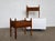 This pair of oak bedside tables was designed by Henning Kjærnulf and produced in Denmark during the 1960s. Each stands on...