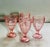 A wonderful set of 1930’s footed glasses in a pale pink square pattern.