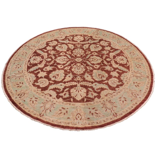 Transform your space with the Kafkaz Chobi Peshawar Round Hand?Knotted Wool Rug, crafted by skilled Turkish artisans using...