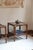 Pair of bedside tables in bamboo and rattan, 1970s. Four straight bamboo uprights, curved hoops on the sides and rattan...