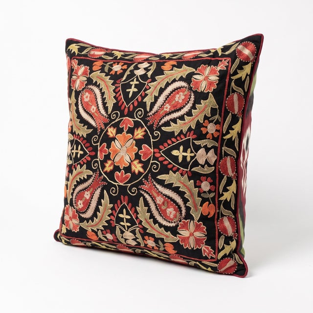 This beautiful hand embroidered suzani fabric is sourced from Uzbekistan. We cut and sew the pillow by hand in our Houston...