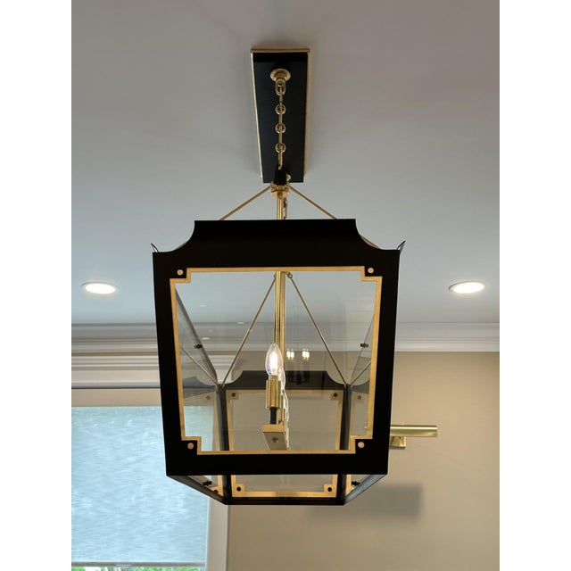 The Julie Neill Caddo Medium Linear Lantern (SKU: JN5023) is a statement lighting fixture designed by Julie Neill for the...