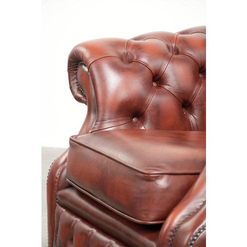 Cowhide Chesterfield Armchair in a Warm Brown Color Scheme For Sale - Image 11 of 13