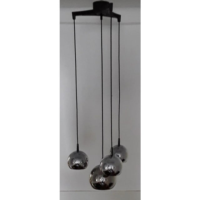 Vintage Cascade Lamp with 4 Chromed Metal Spheres, 1 Large & 3 Small on a Black Plastic Outlet, 1970s, in Good conditions....