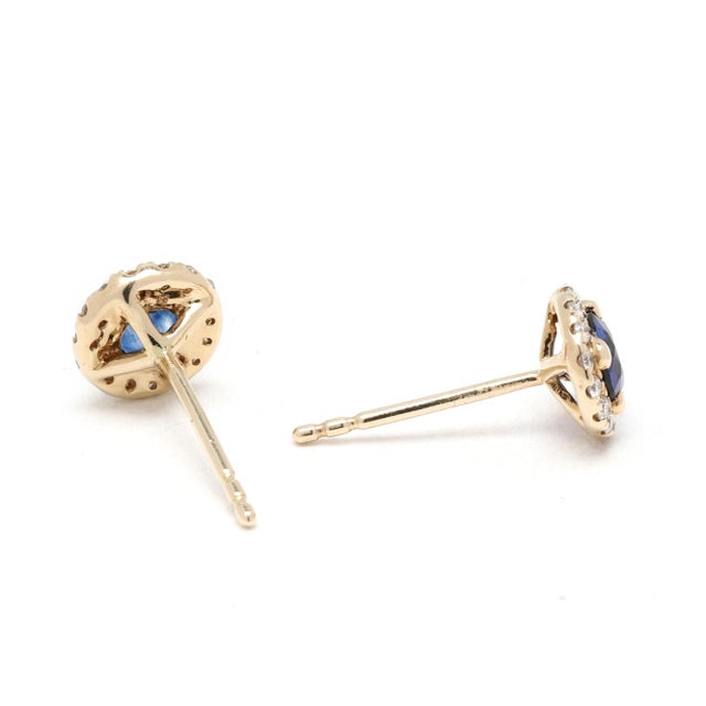 Stones: sapphire, 2 stones round 4 mm approximately .70 total carats diamonds, 30 stones 1 mm approximately .15 total...