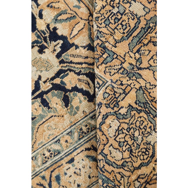 Tabriz is one of the oldest and most renowned weaving centers in the world. This antique Persian rug, made circa 1900, is...