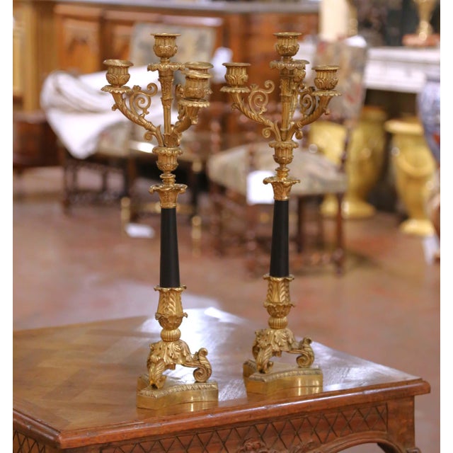 Bring stately elegance and classical refinement to a mantel, buffet, or console with this striking pair of French Empire...