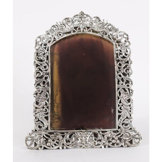 A superb Antique Edwardian decorative sterling silver photo frame with hallmarks for Rosenthal, Jacob & Co., London 1891,...