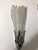 Pair of French Art Deco sconces by G Leleu. Having clear frosted glass shades with geometric motif details throughout....