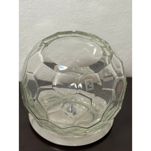 Authentic FENDI Casa decorative crystal glass vases, sold as a matching set of two. These sculptural vases feature a...
