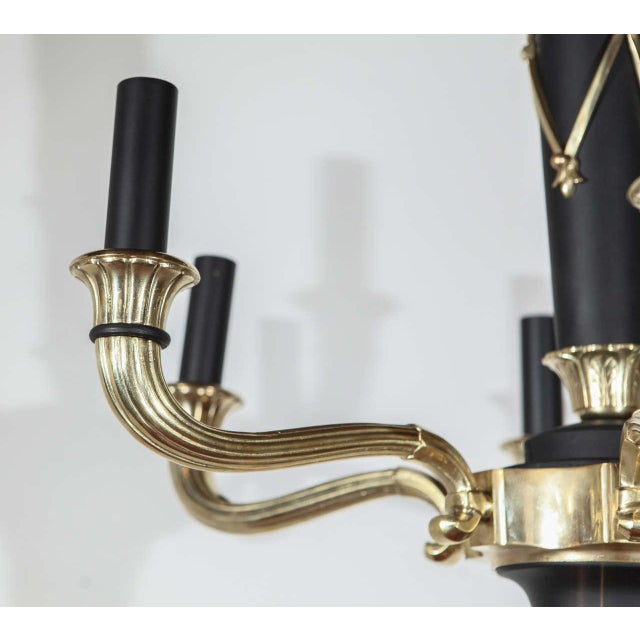 French Regency Revival style chandelier, circa 1940. Newly rewired for six candelabra bulbs, bulbs can be up to 75 watts...