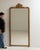 A mirror whose gold gilt frame with crest, floor-length tall gives it real character at first glance. It was made in...