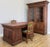 An impressive Antique French double sided desk in Oak, featuring richly carved pedestal fronts, turned column details and...