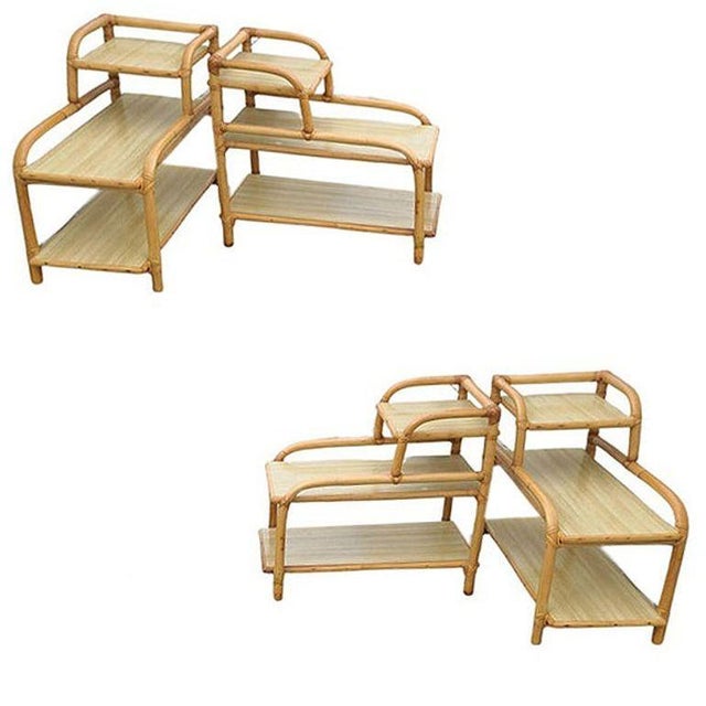 Beautifully restored set of four 3-tier side tables featuring a single stand frame with blond Formica tops and steam-bent...