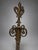 A pair of French brass gate post finials, probably early to mid 19th century now mounted on clear Lucite display bases....