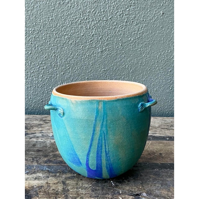 This striking original studio pottery vessel is a luminous example of mid-century modern artisanal craft. Hand-thrown with...