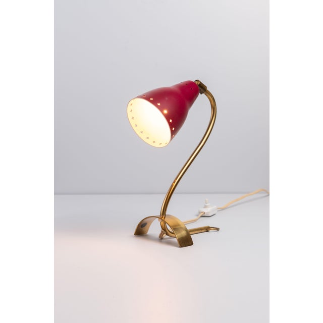 This vintage Swedish brass lamp combines timeless elegance with versatile functionality, making it a striking addition to...
