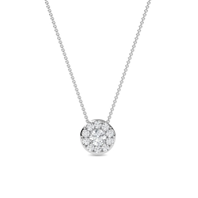 This is part of Chairish’s Fine Jewelry assortment. Classic Halo 3/4 ct Pendant 3/4 CT TW RD HALO PENDANT IN 14KW 13 DIA...