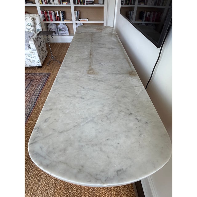 Country marble top console, oak table with two drawers and black marble base, casters