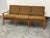 Design Plus Gallery presents a Circa 1960's Danish Three Seater Sofa from Komfort. The sofa has a teak frame with an open...