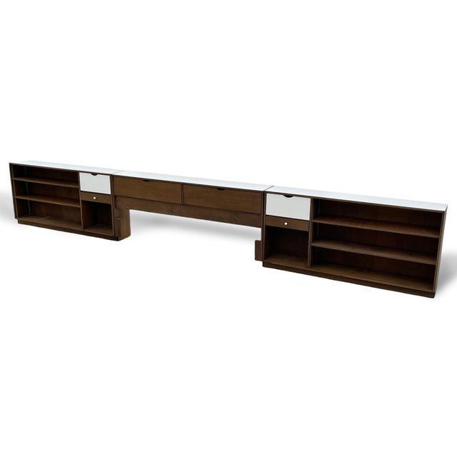 This very large, very impressive piece designed by Marianne Willisch features a king-size storage headboard is flanked by...