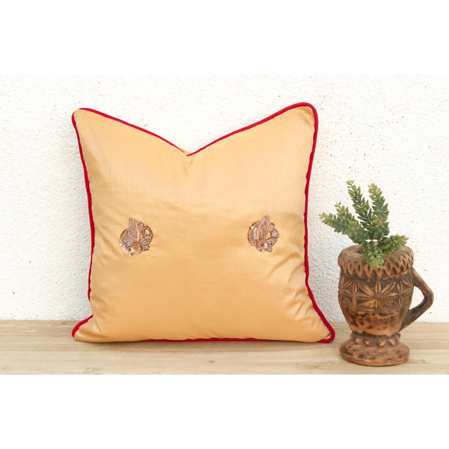 Crafted in India from a lustrous silk-blend textile, this pillow cover is embellished by hand with traditional Zardozi-...